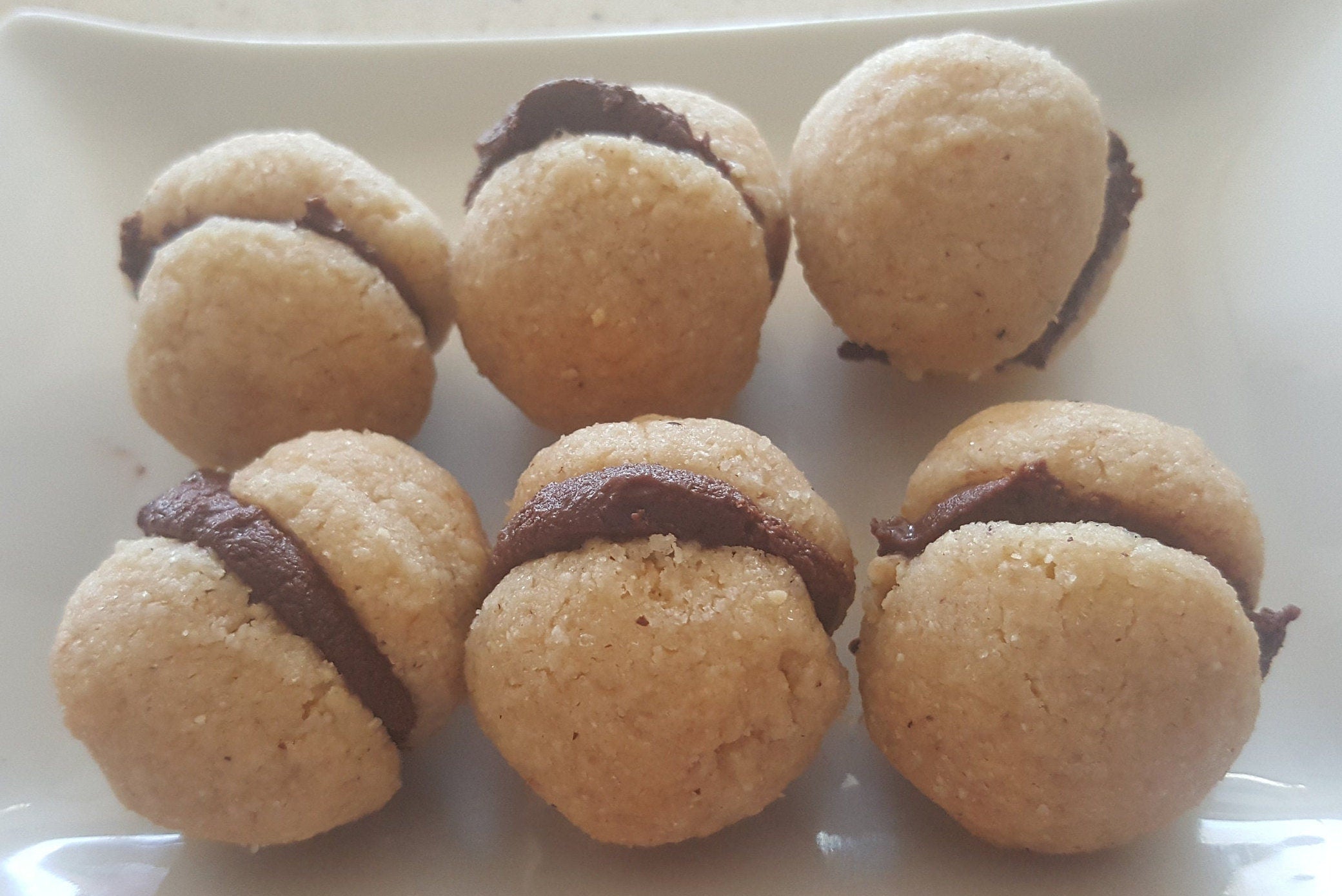 Italian Hazelnut cookies aka Baci di Dama with homemade Nutella